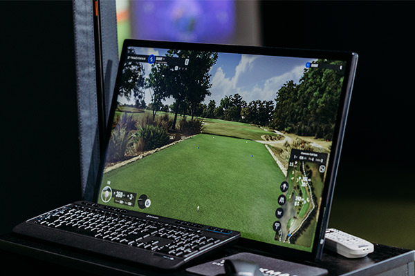 trackman at a laptop